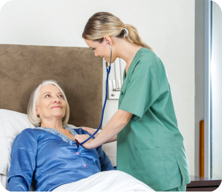 a female nurse and an elderly woman